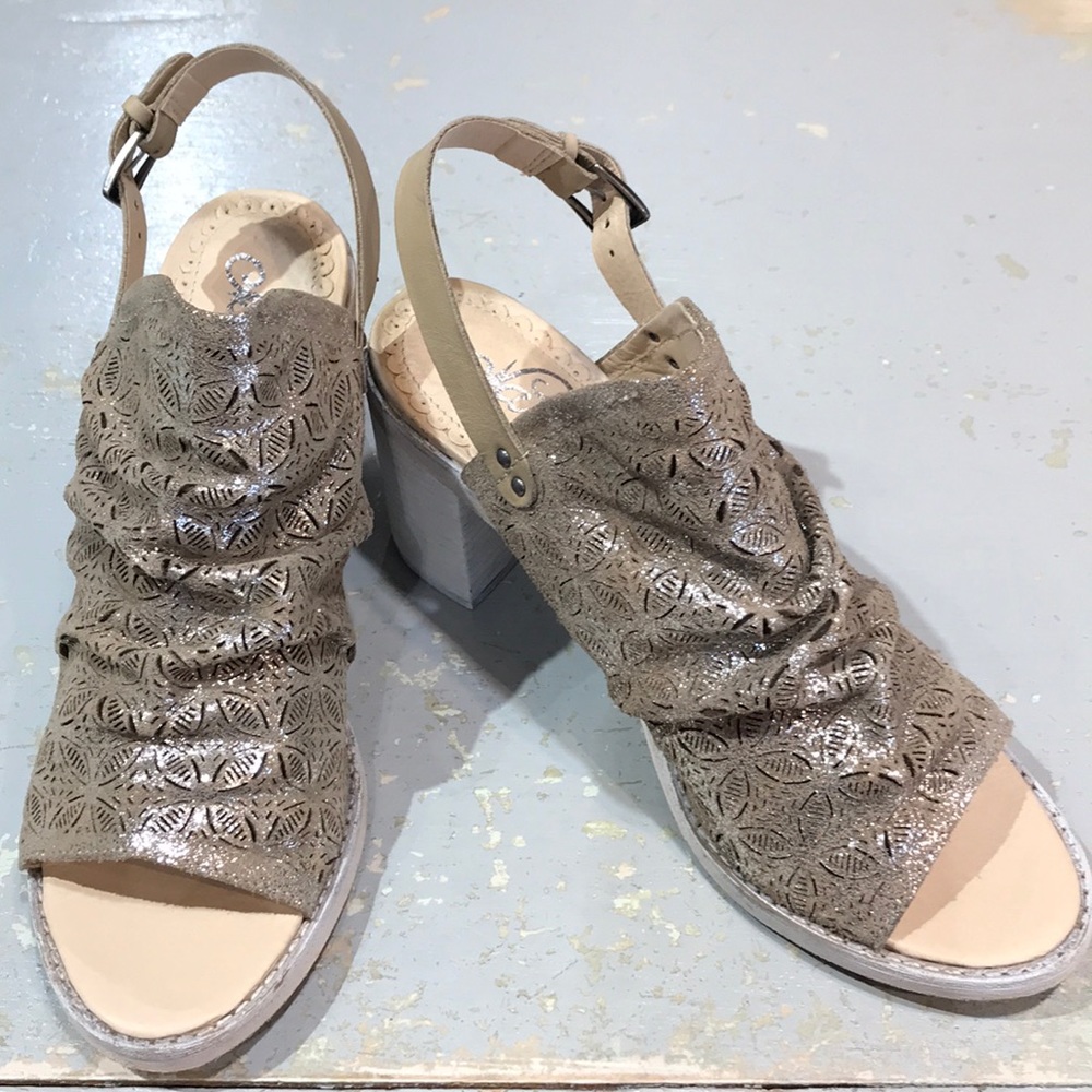 Scrunched leather metallic open-toed booties.